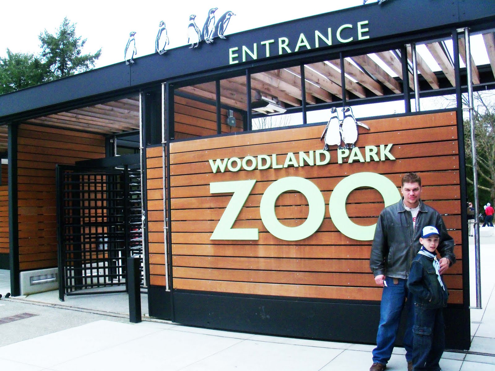 The side west of aurora is largely occupied by the woodland park zoo, but also includes some picnic space, a formal rose garden, a few open spaces, and a play area. Seattle's Woodland Park Zoo